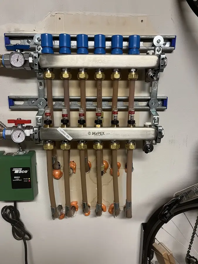 Plumber performing Water Heater Repair at a residential property in Gering